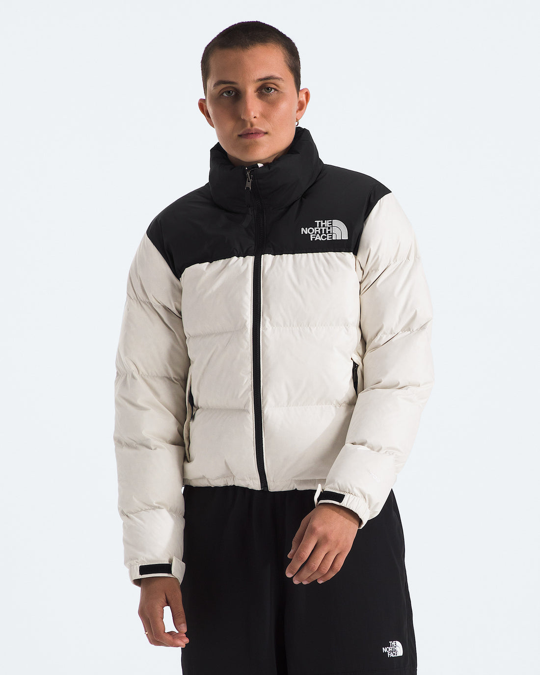 The North Face Women’s 1996 Retro Nuptse Jacket in White Dune/TNF Black/Recycled Down, front view