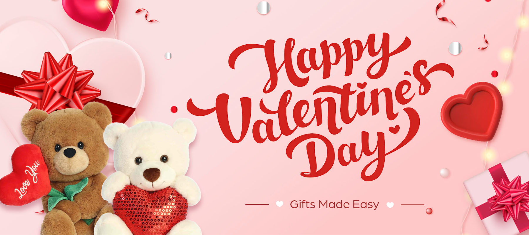 Horizontal website banner for Valentine's Day gifts showing two cuddly teddy bears next to wrapped gift boxes with red bows. Text reads "Happy Valentine's Day - Gifts Made Easy" on a festive pink background.