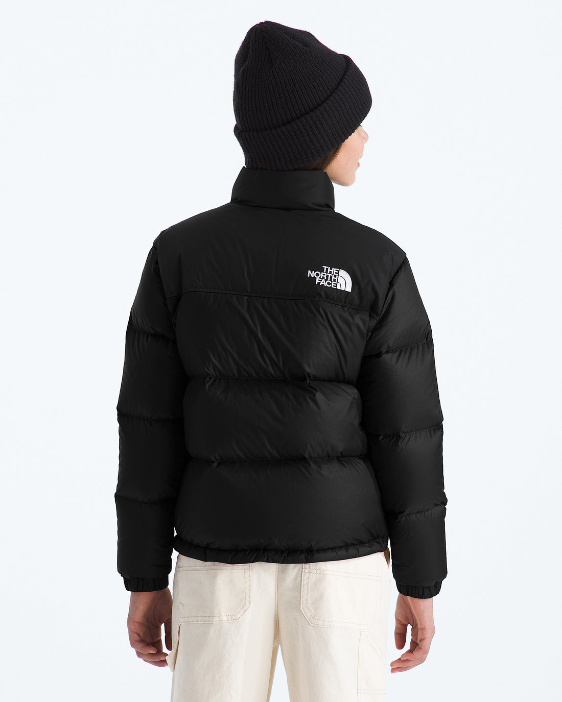 The North Face Boys’ & Girls’ 1996 Retro Nuptse Jacket in TNF Black, back model view