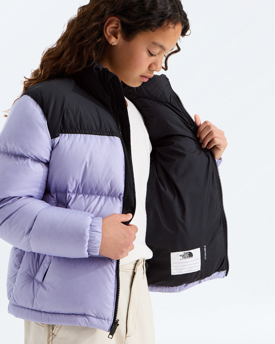The North Face Boys’ & Girls’ 1996 Retro Nuptse Jacket in Pale Plum, interior lining and ID label detail