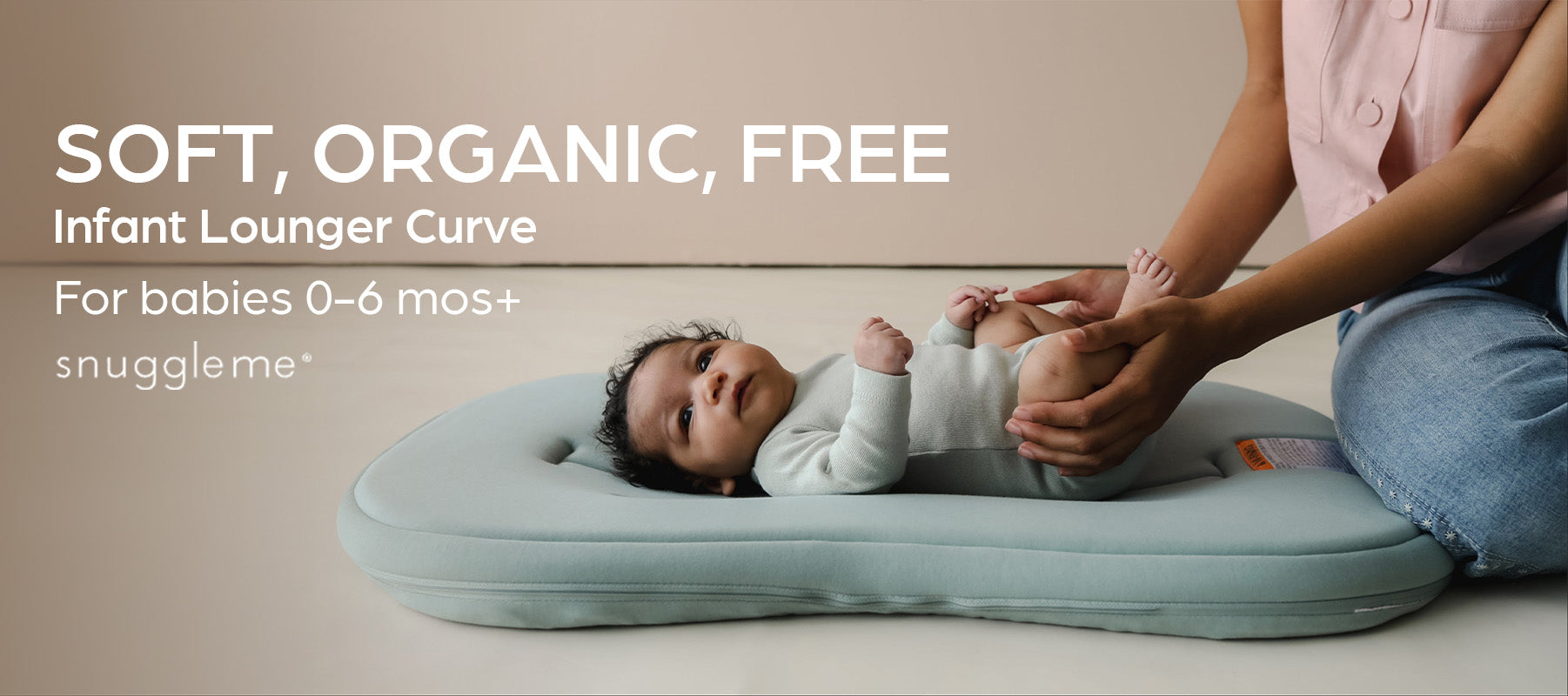 Snuggle Me Infant Lounger Curve in sage green organic baby lounger with newborn lying down lifestyle banner