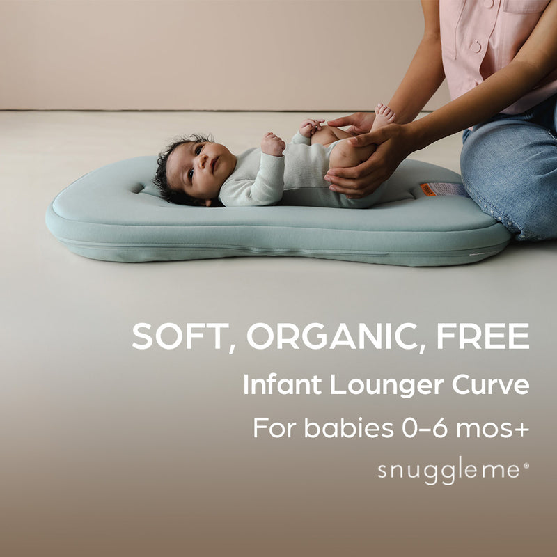 Snuggle Me Infant Lounger Curve organic baby lounger in sage green with newborn for ages 0–6 months lifestyle image