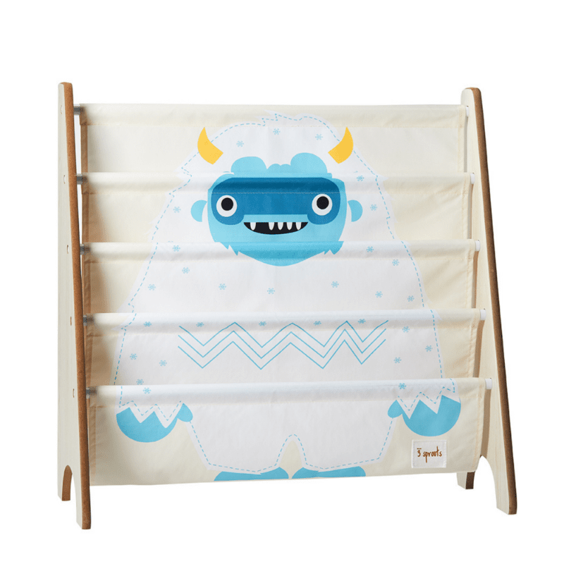3 Sprouts book rack in cream fabric with blue monster print on a wooden frame