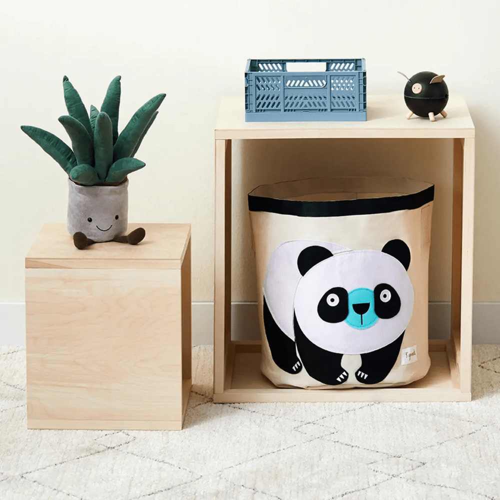 3 Sprouts Storage Bin panda print in beige fabric with black trim, neatly tucked inside a light-wood cube shelf