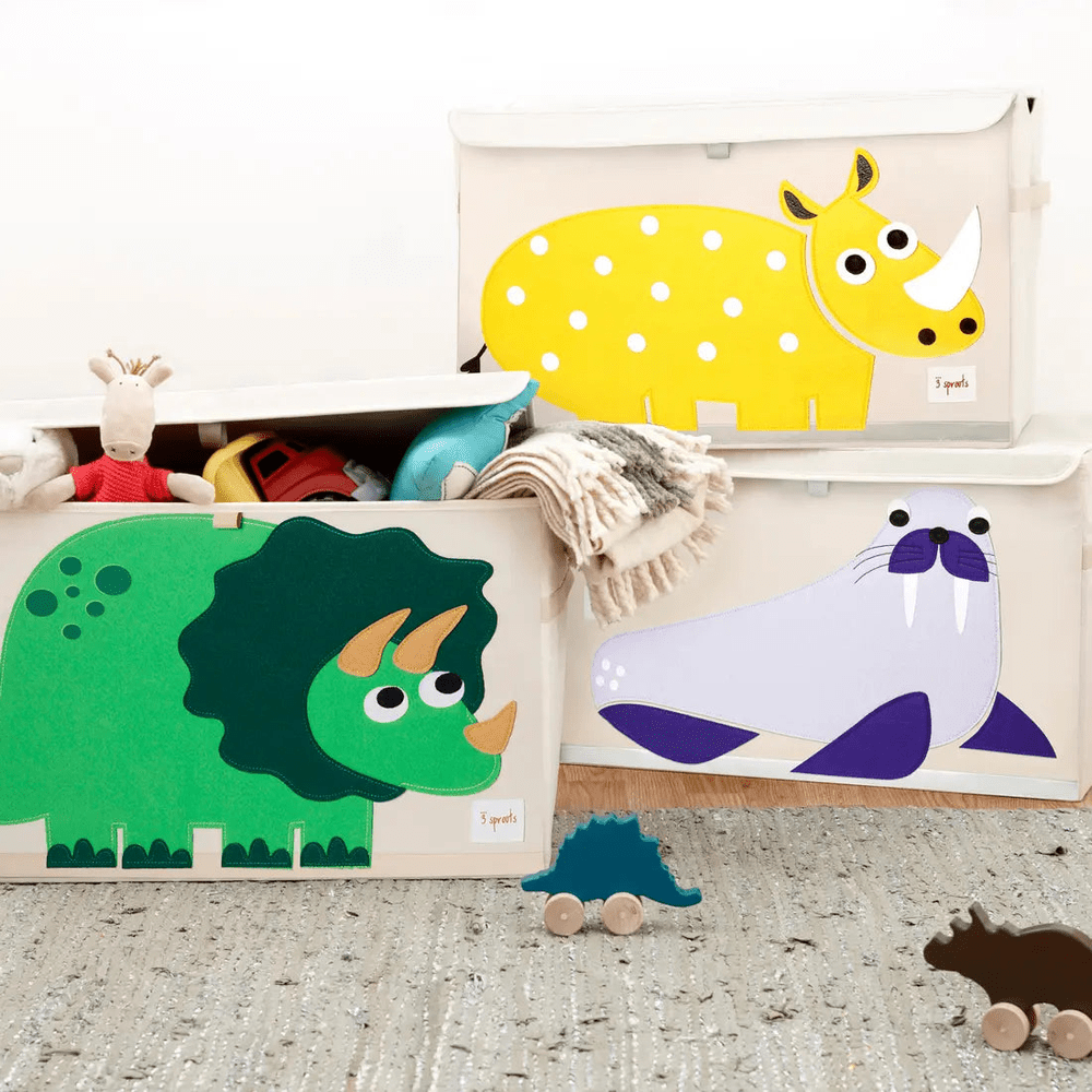 3 Sprouts Toy Chest beige storage with three playful animal designs—green dinosaur, yellow polka rhino, purple seal—holding toys.