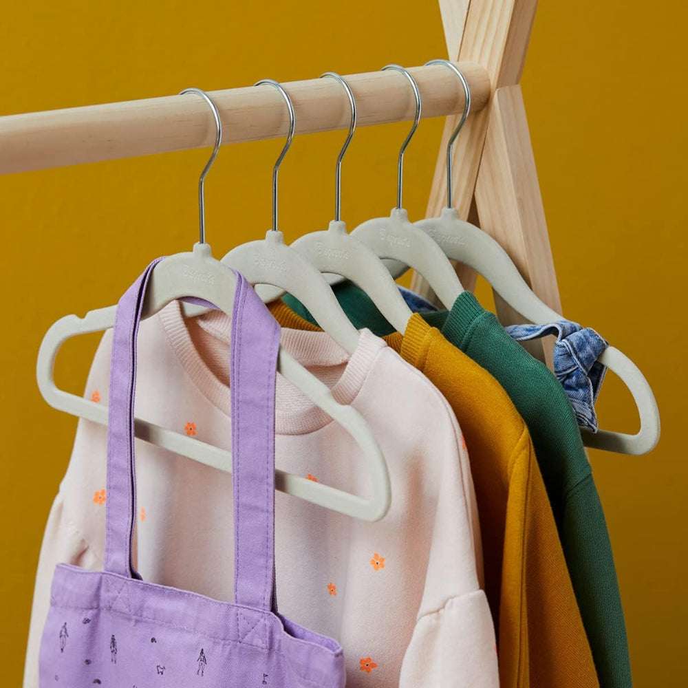 Baby clothes hangers, 10-pack, gray non-slip design with pastel garments on a wooden rack