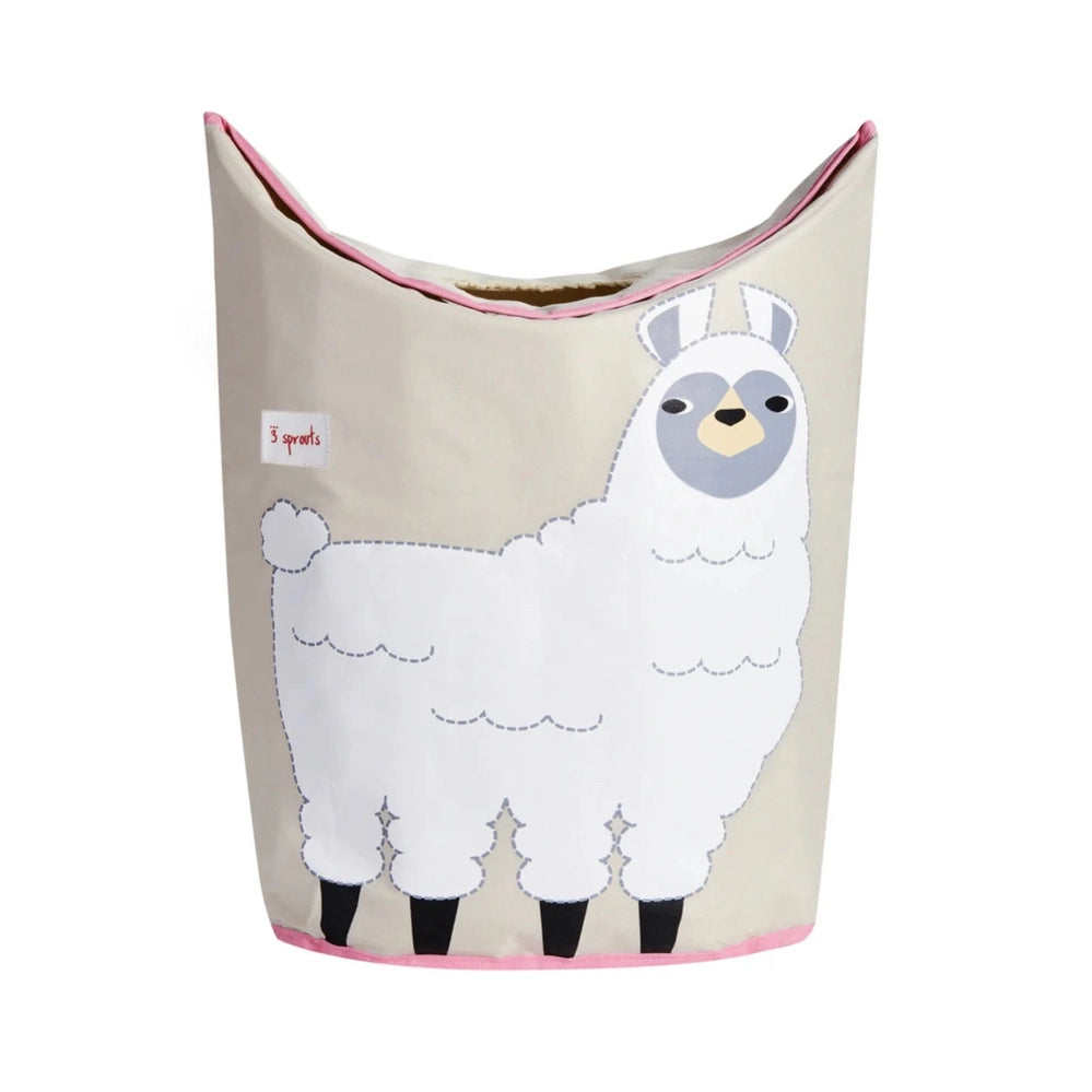3 Sprouts laundry hamper featuring a beige body with a white llama illustration and pink trim