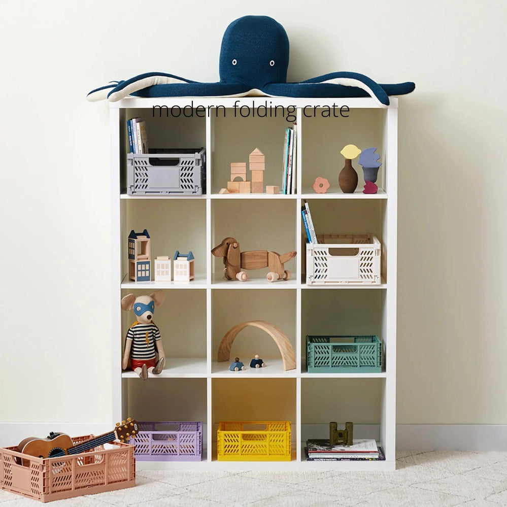3 Sprouts Modern Folding Crate Clay in a white cubby shelf with pastel crates and wooden toys