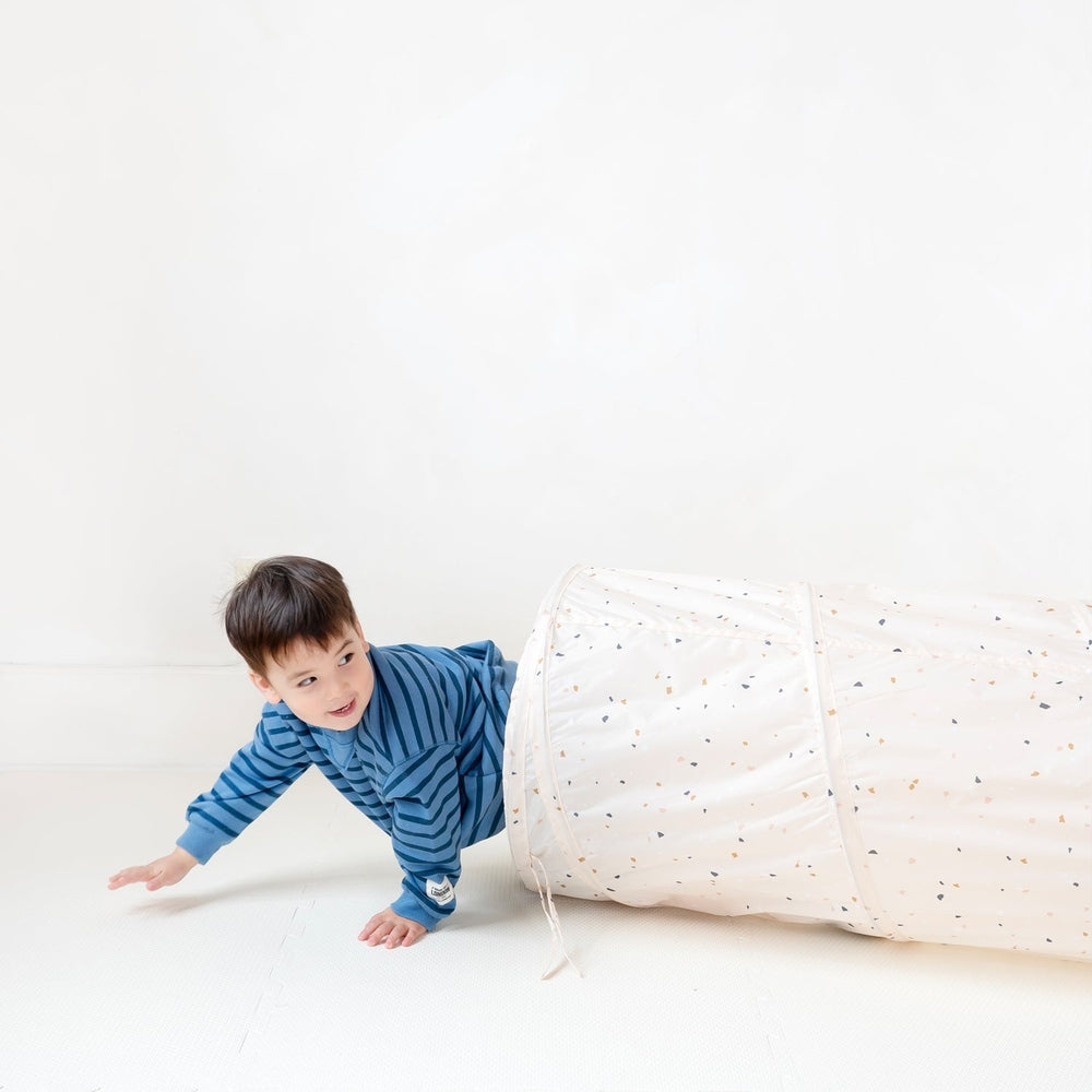 3 Sprouts recycled fabric play tunnel, white with colorful specks for kids' indoor play