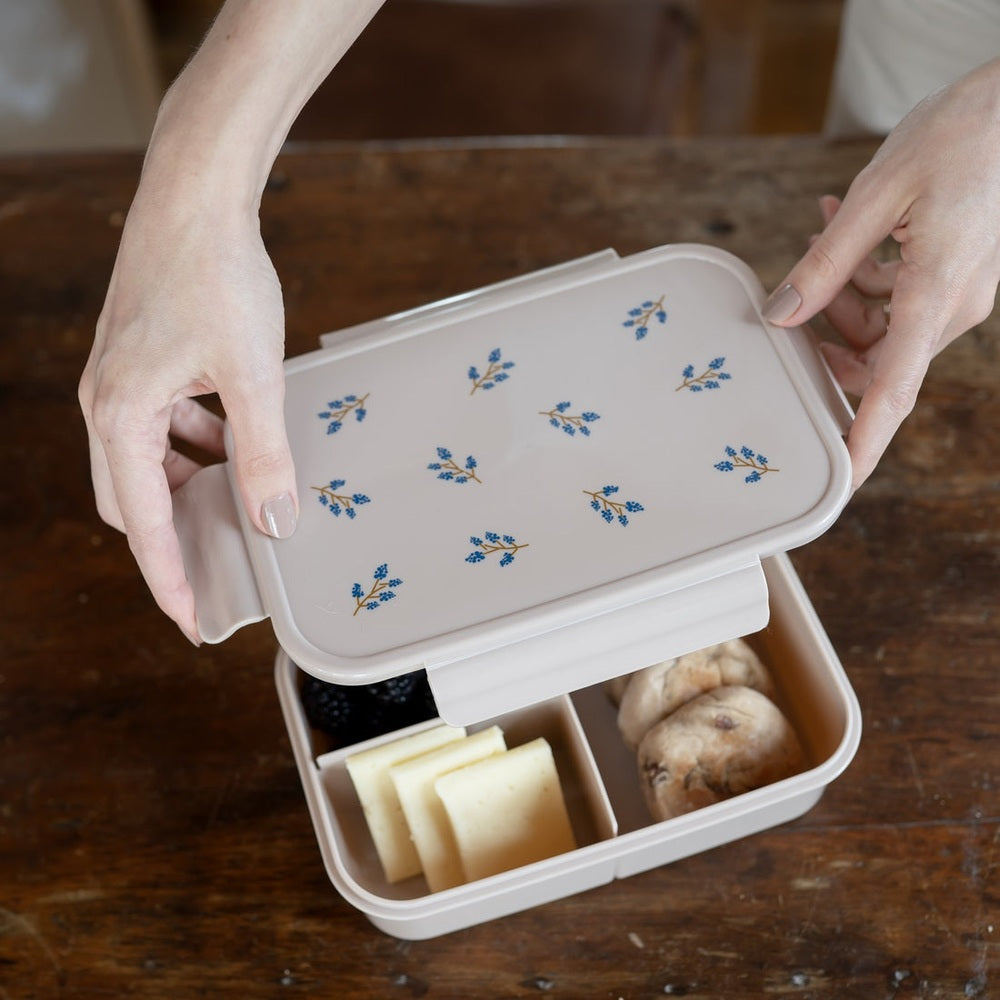 3 Sprouts recycled plastic bento box with blue floral lid and divided snack compartments