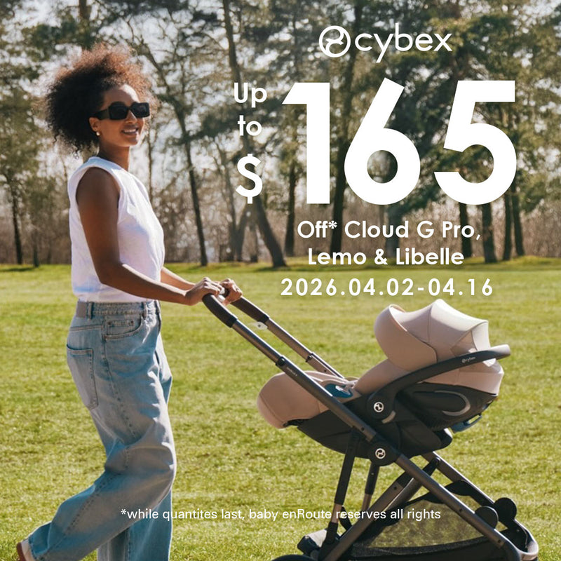 Cybex Cloud G Pro Infant Car Seat on stroller in Beige outdoor lifestyle view vertical