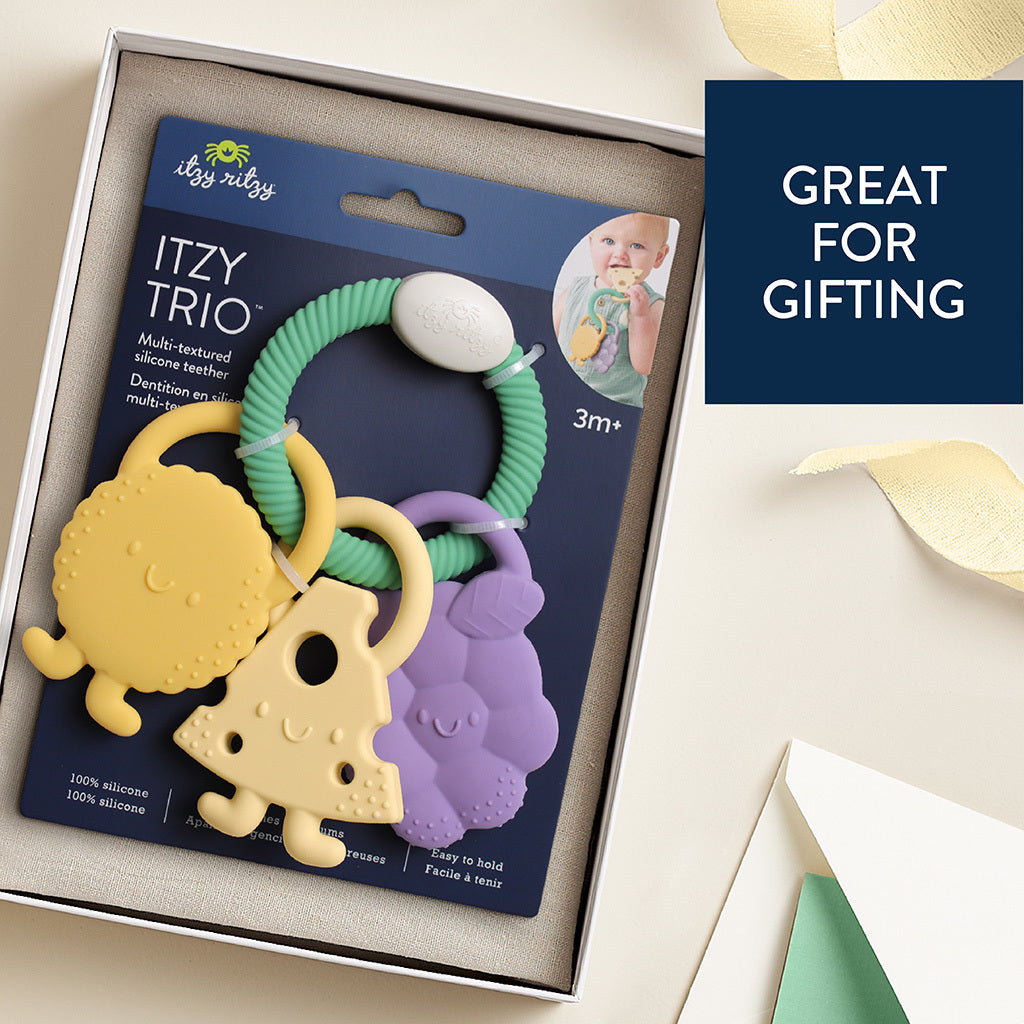 Itzy Ritzy Itzy Trio Charcuterie teething toy with three chewable silicone charms