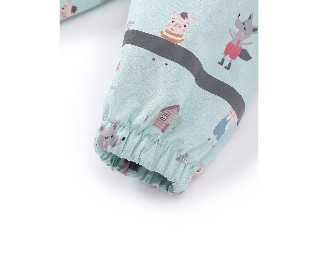 Children's leggings with animal and road design on a light green background
