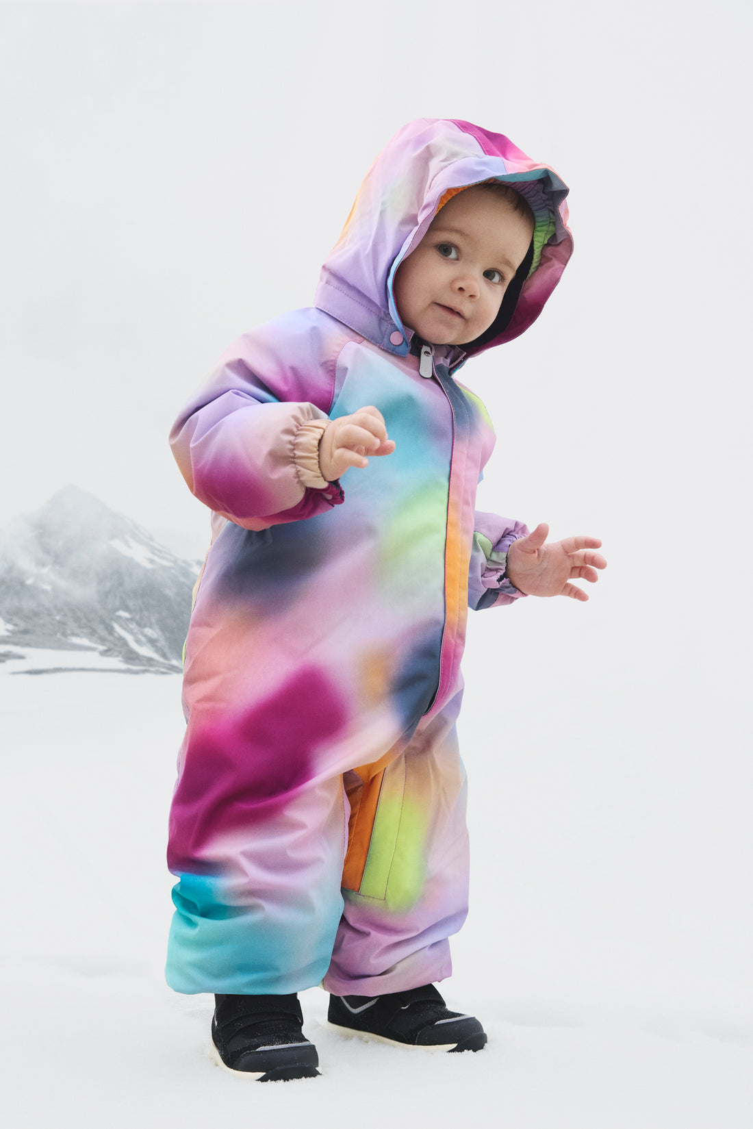 Color Kids Baby Printed Snowsuit Wild Aster front view worn by a toddler in the snow