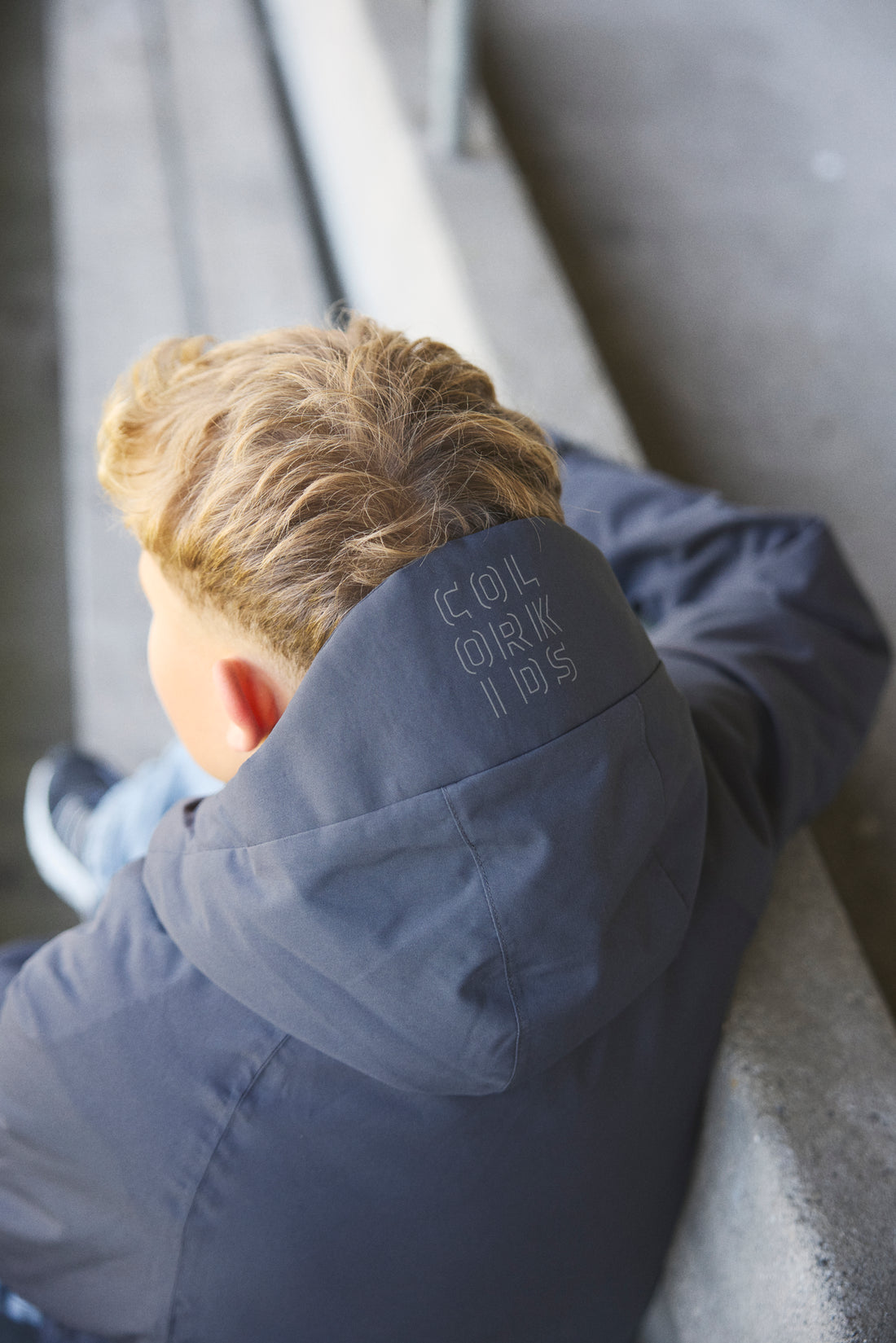Color Kids junior jacket in Phantom — worn outdoors, back and hood view