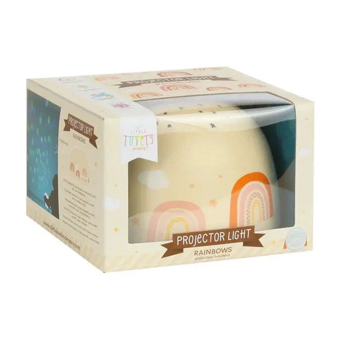 A Little Lovely Company Projector Night Light in cream ceramic with pastel rainbow design, shown in its box.