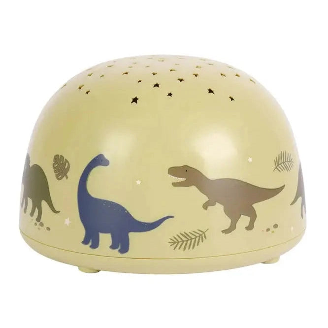 A Little Lovely Company Projector Night Light in pale yellow, featuring dinosaur silhouettes and star-cut top.