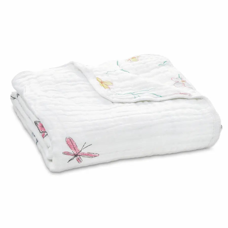 Aden+Anais Classic Dream Blanket, white muslin with pink butterfly embroidery, neatly folded.