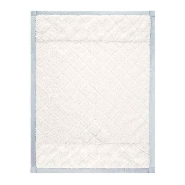 Aden+Anais Embrace Winter Sky weighted toddler blanket with cream quilted fabric and light blue border