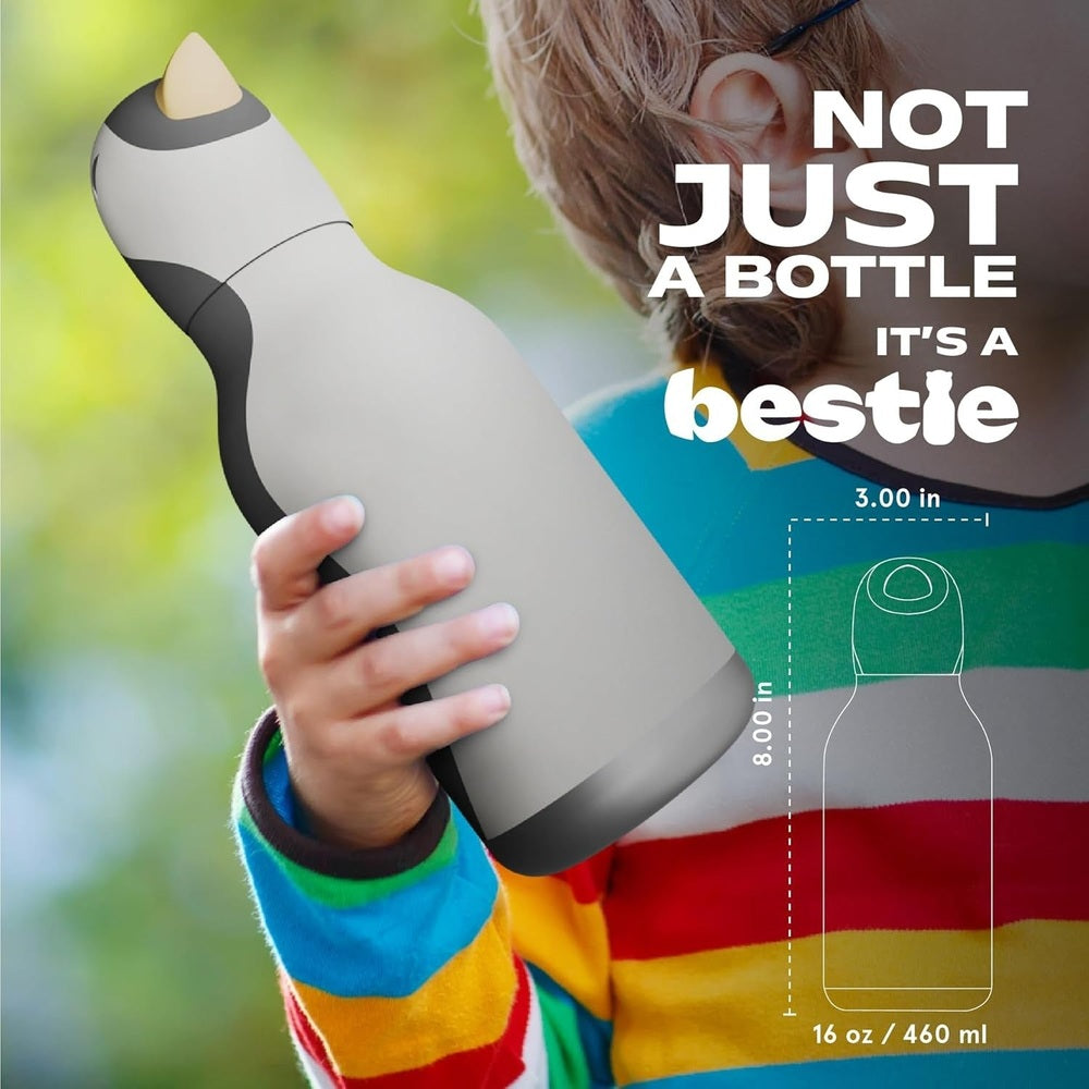 Asobu Bestie Animal 16oz penguin bottle, black/white double-wall stainless steel, gripped by a child.