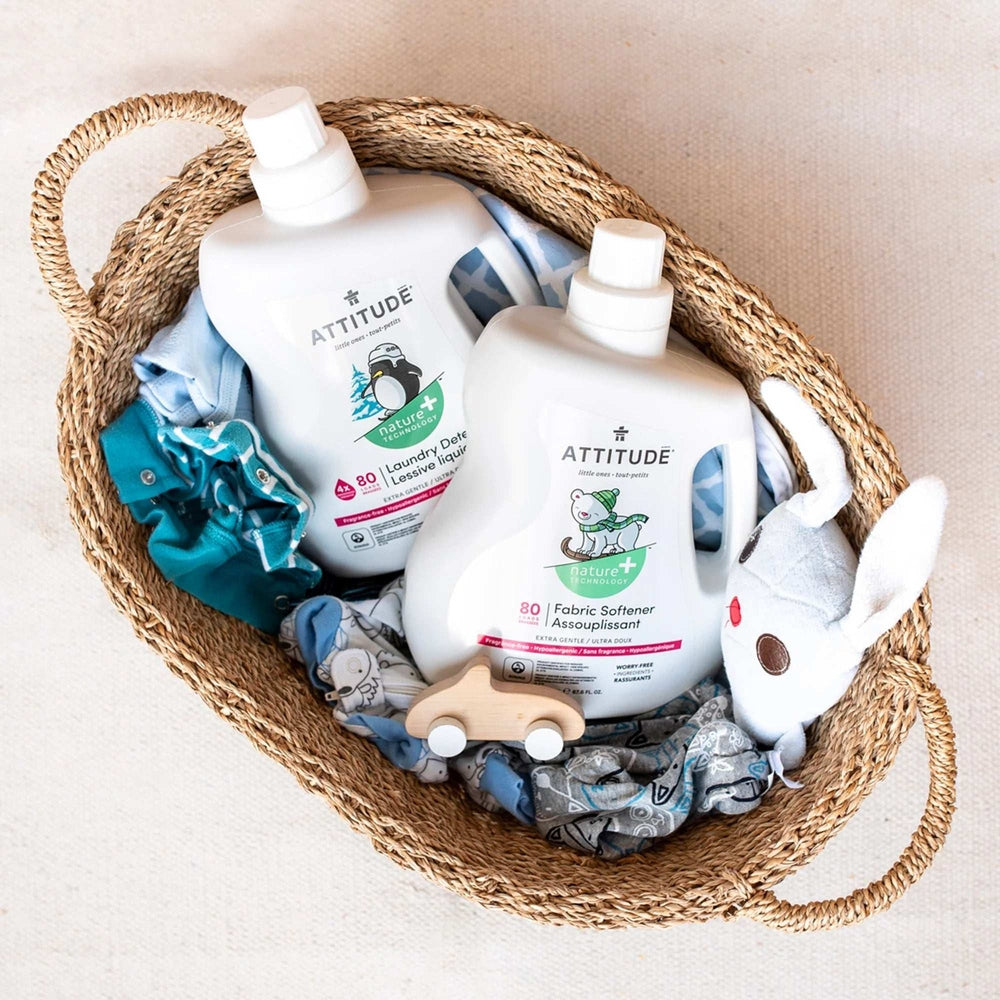 Attitude Fabric Softener 2L fragrance-free, set of 2 bottles in a woven basket with baby clothes