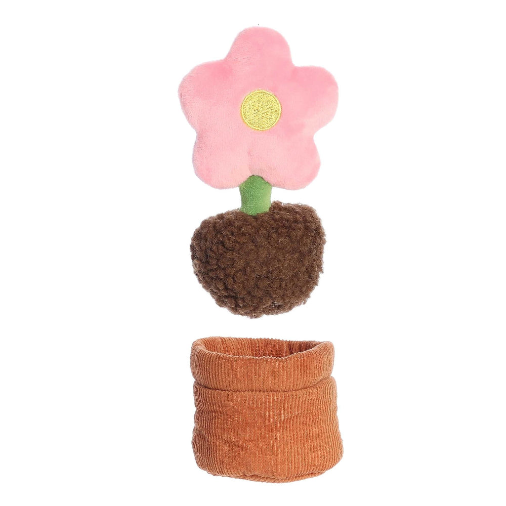 Aurora Ebba Baby Talk My First Flower plush toy with pink bloom, yellow center, green stem, in orange knitted pot