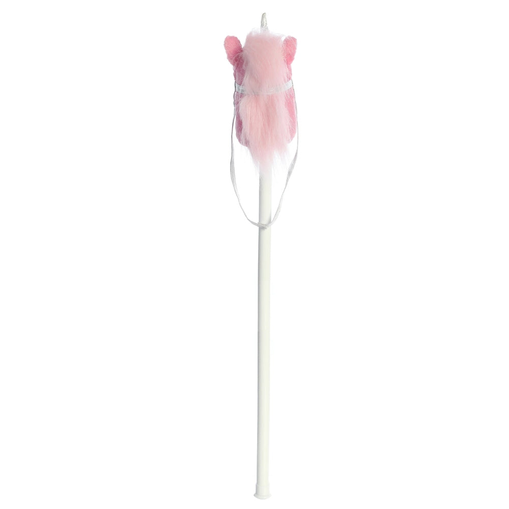 Pink fluffy unicorn head with horn and ears atop a white plastic wand, accented by a silver cord.