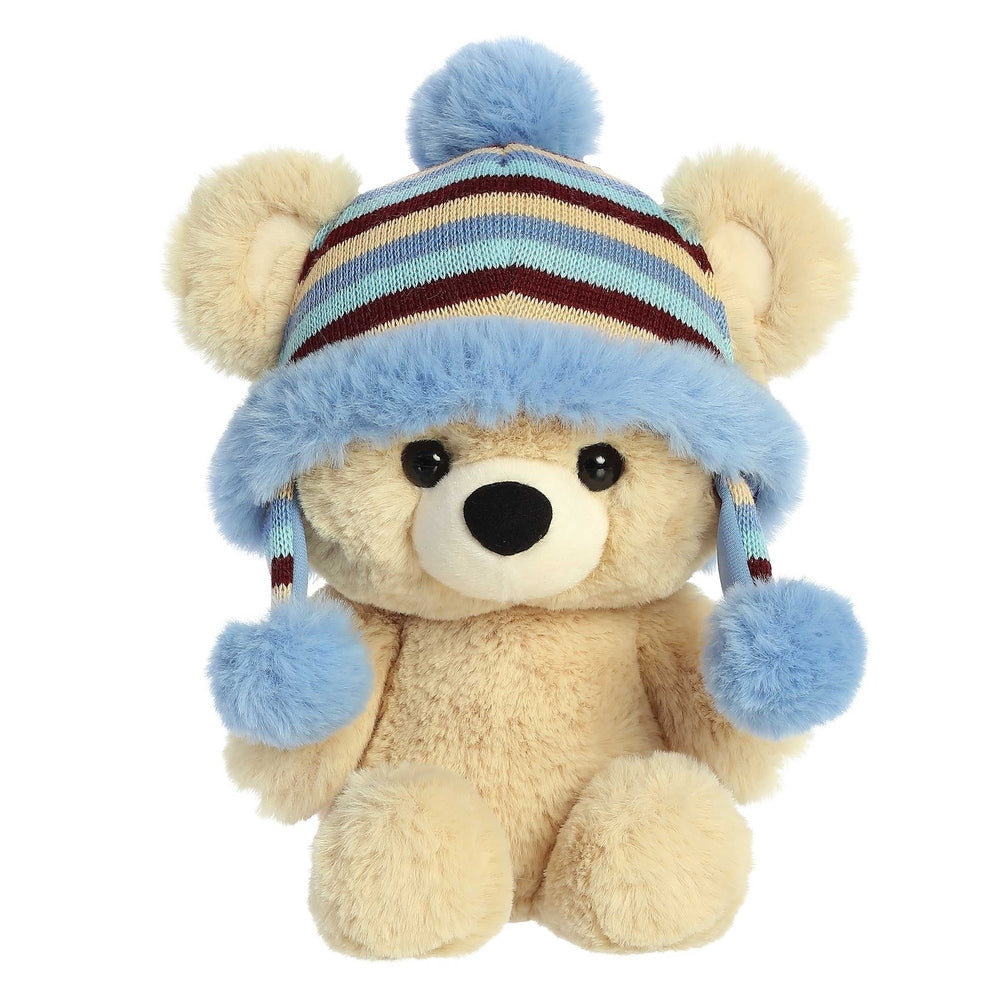 Aurora Bonnie 13-inch plush bear wearing a blue striped knit hat with pom-poms