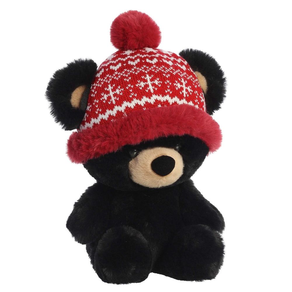 Aurora 13in baby bear plush with red knit winter hat, white snowflake pattern, and red fur trim