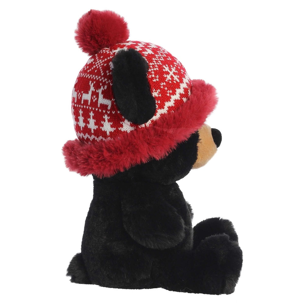 Aurora Baby Bear Bucky plush, 13in, black with tan muzzle, red knit hat with white snowflake pattern