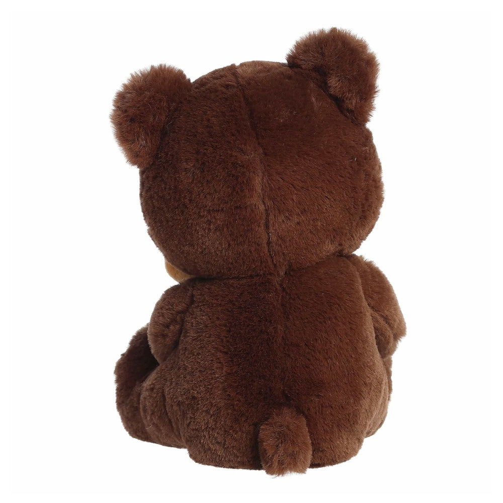 Aurora Holiday Barista Bear Gingerbread Man 10" plush toy; brown fluffy bear seen from back,
