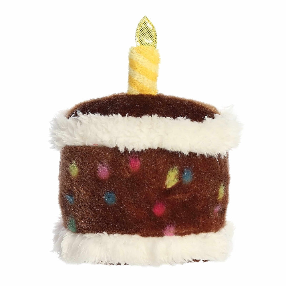 Aurora Palm Pals Choco Birthday Cake plush, 5-inch brown cake with white fur trim, multicolor sprinkles and yellow candle