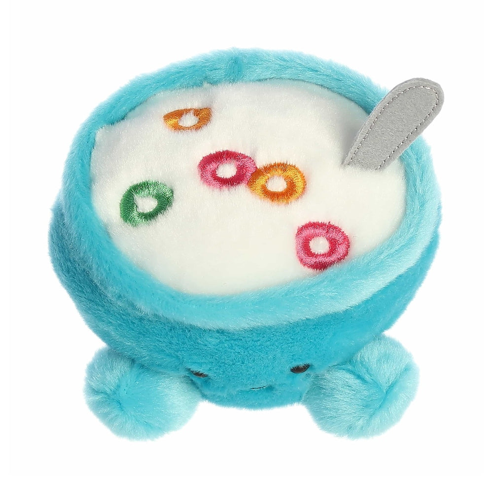 Aurora Palm Pals Trixie Cereal 5in plush toy, bright blue with white face, colorful cereal rings, seated with tiny paws.