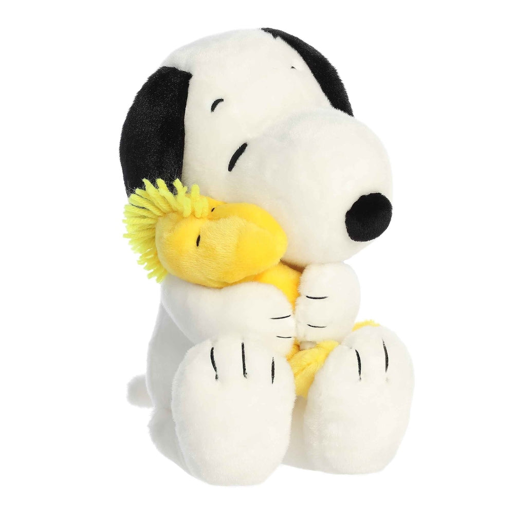 Aurora Snoopy and Woodstock 12-inch plush stuffed animals, white Snoopy with black ears and yellow Woodstock