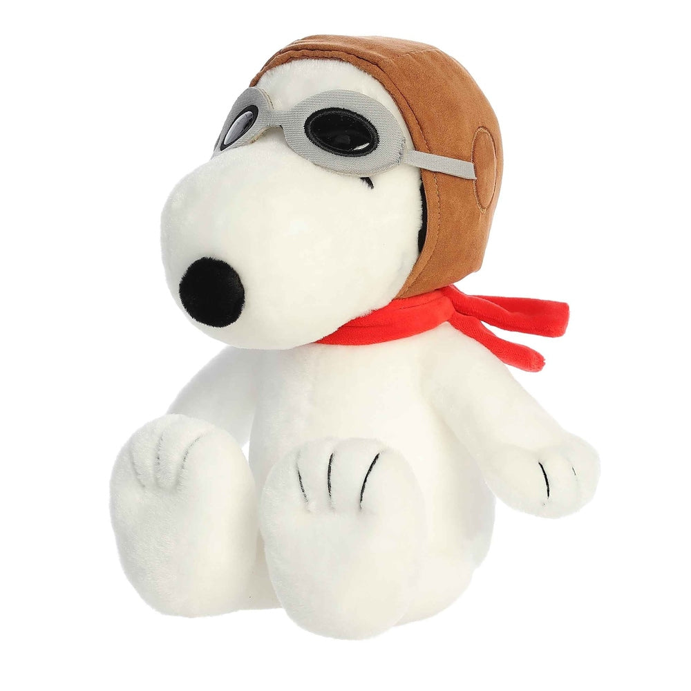 Snoopy plush stuffed animal, 12 inches, in brown pilot helmet with gray goggles and red scarf by Aurora