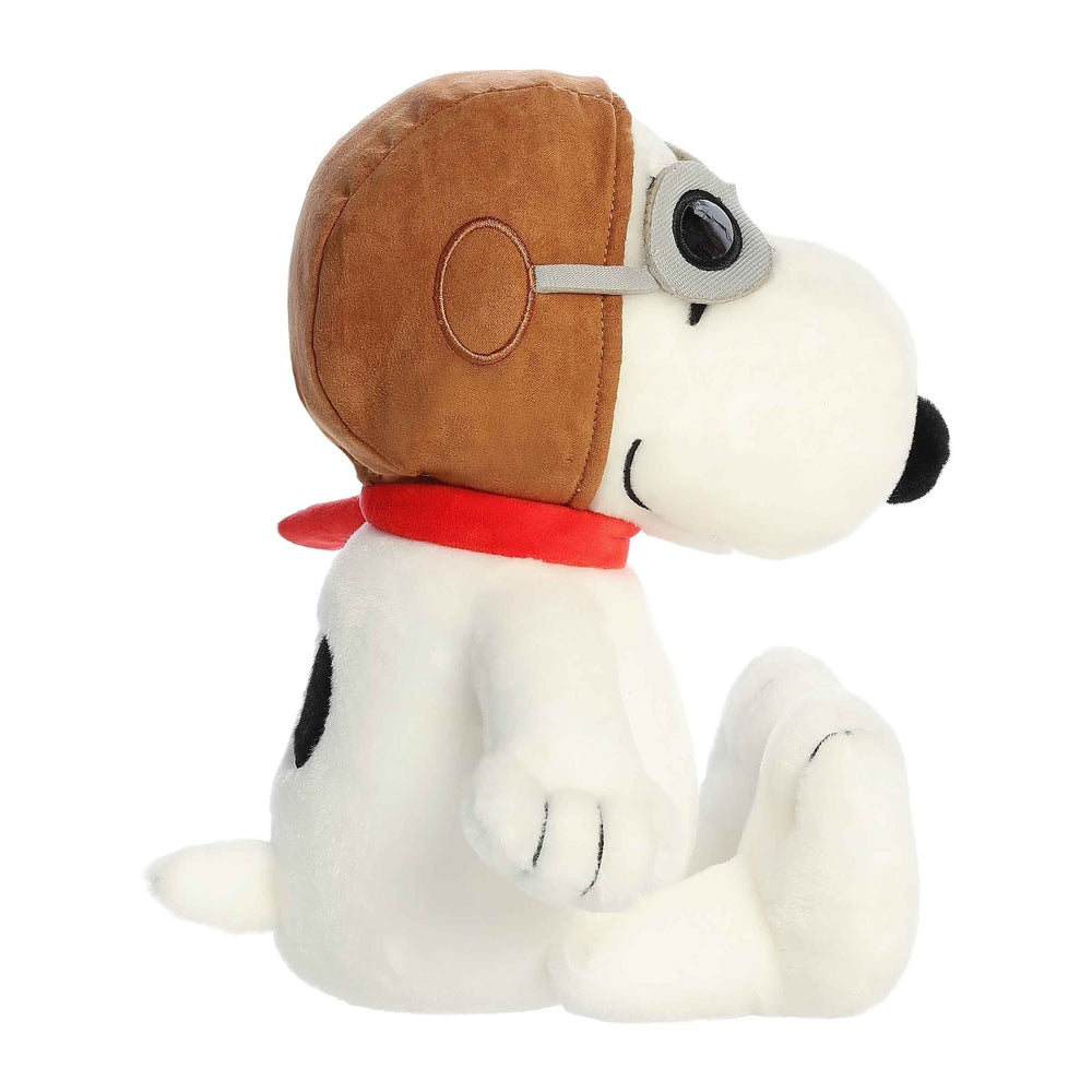 Snoopy Flying Ace stuffed animal by Aurora, plush beagle wearing brown aviator helmet, gray goggles, red scarf