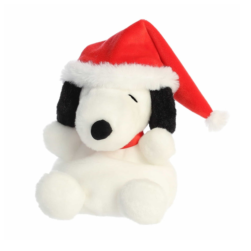 Aurora Peanuts Palm Pals Santa Snoopy plush toy in red Santa hat, white body with black ears.