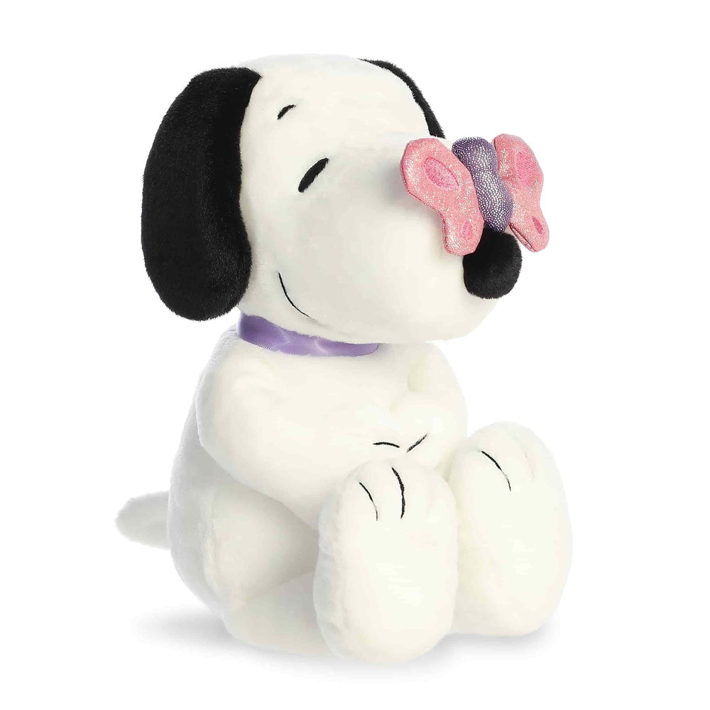 Snoopy plush 11" by Aurora, white with black ears, purple collar, and glitter pink bow (stuffed animal)