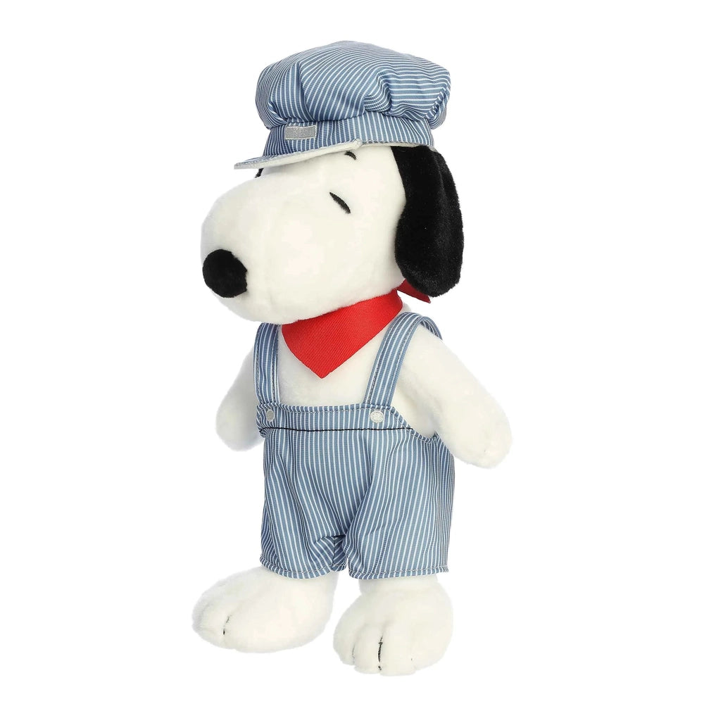 Aurora Peanuts Train Engineer Snoopy 14" stuffed toy standing in blue striped overalls, cap, and red scarf.