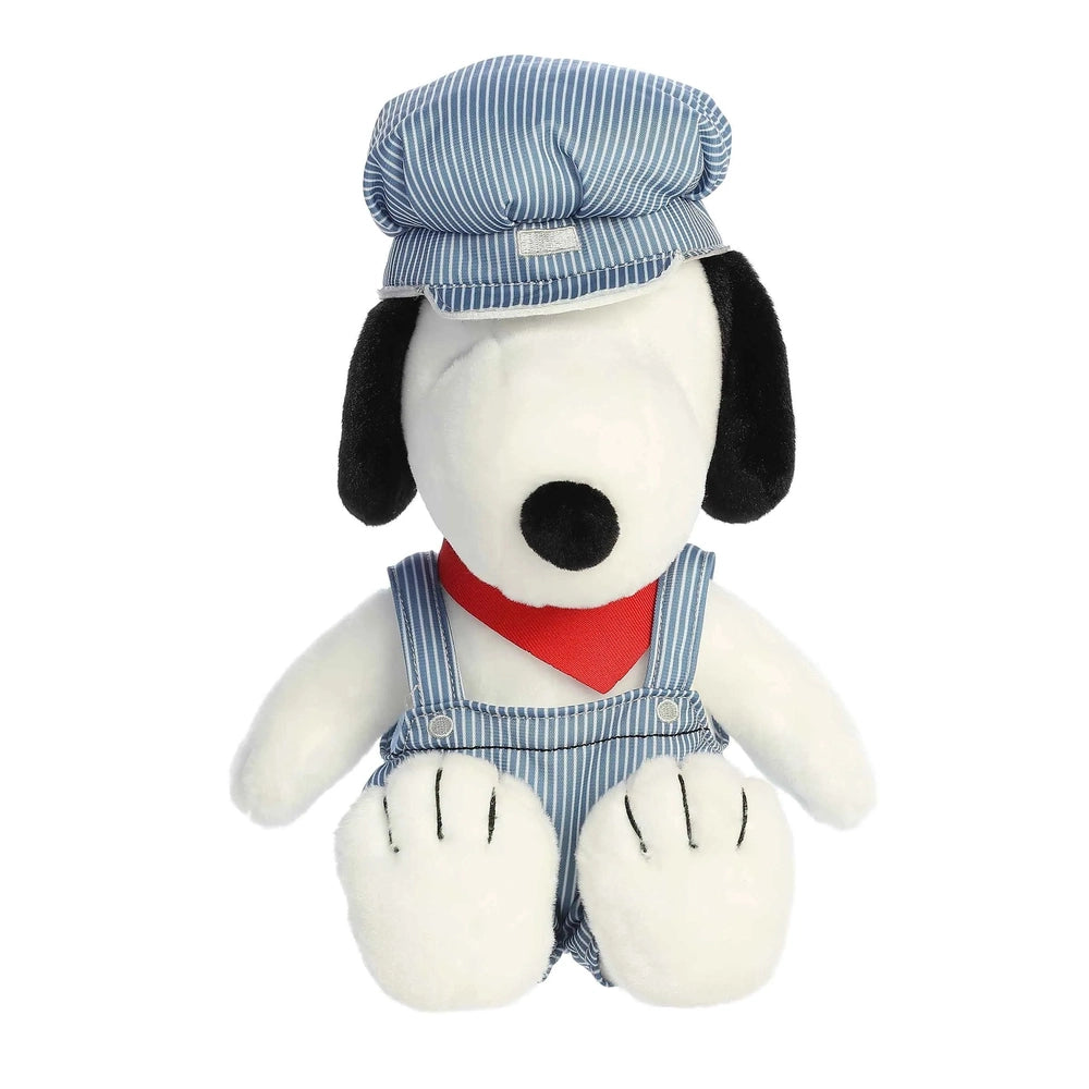 Aurora Peanuts Train Engineer Snoopy 14" stuffed toy wearing striped cap and overalls with red scarf, sitting.