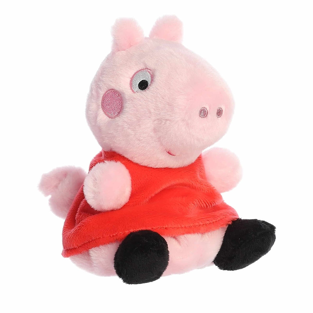 Peppa Pig Palm Pals plush toy by Aurora, 5-inch pink plush in red dress with black feet