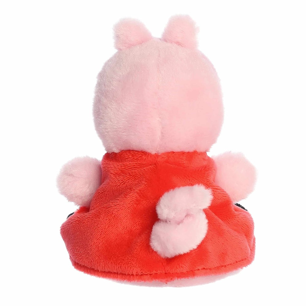 Peppa Pig Palm Pals stuffed animal by Aurora, pink with red dress (back view)
