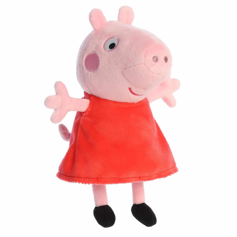 Plush Peppa Pig stuffed toy by Aurora in a red dress; pink body and black shoes