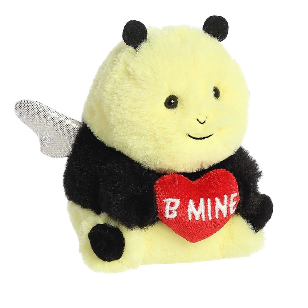 Yellow plush bee toy with black limbs, silver mesh wing, holding red heart reading B MINE.
