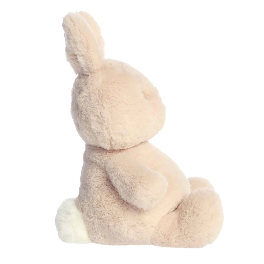 Aurora Spring Dumplin plush bunny in cream fur, seated with one ear upright