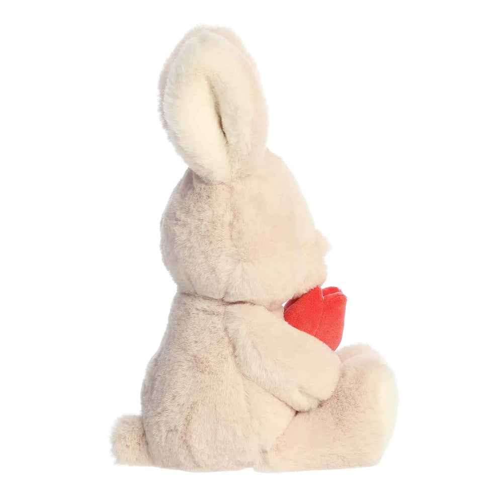 Aurora 10in Spring Flower Blossom Bunny plush toy, beige fluffy stuffed animal holding a red heart
