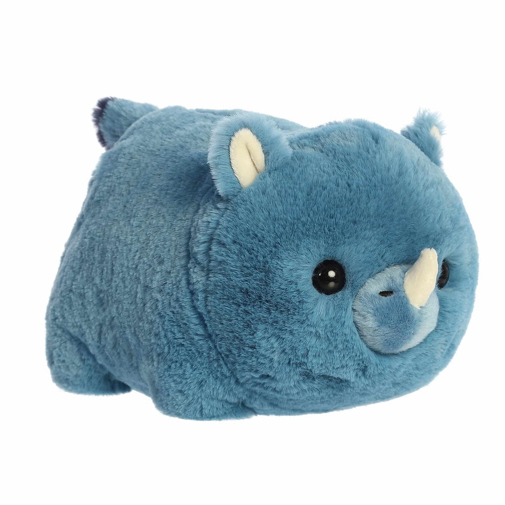 Aurora Spudsters Rio Rhino 10" plush toy, blue stuffed rhino with beige horn resting on its belly.