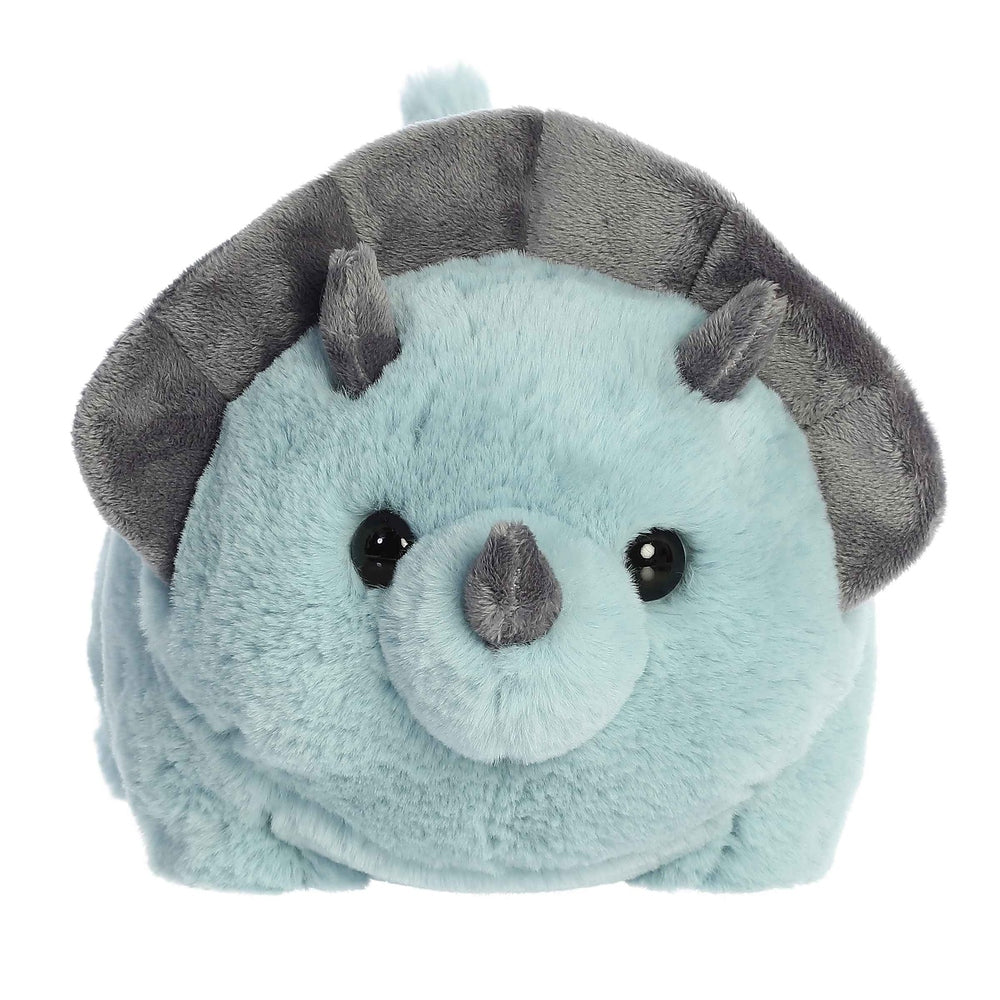 Aurora Spudsters Taren Triceratops 10" plush toy, light blue with gray frill, sitting upright with big eyes.