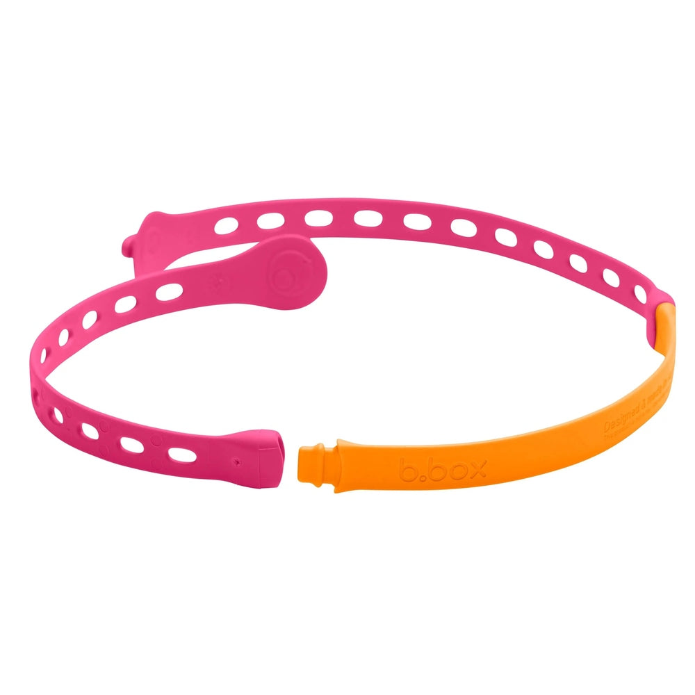 B.Box Connect A Cup sippy ring, pink with orange cap, shown clasped for secure grip and spill-proof sipping.