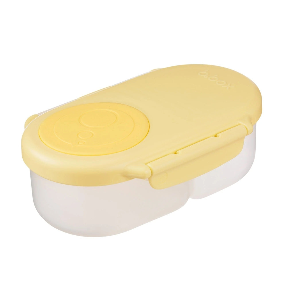 B.Box Snackbox with yellow lid, dual-compartment white base, closed securely with side latches.